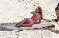 Candice Swanepoel in a bikini - ass