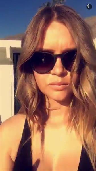 Josephine Skriver in a bikini taking a selfie