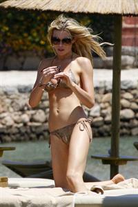 Abigail Clancy bikini candids in Italy on June 11, 2011