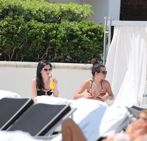 Selena Gomez in bikini by a hotel pool in Miami 5/11/13 