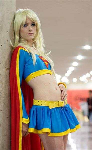 Girls dressed up as Supergirl
