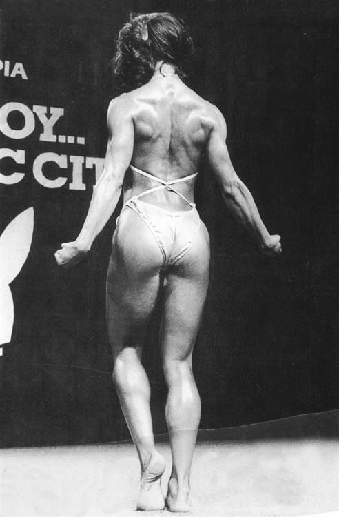 Rachel McLish in a bikini - ass