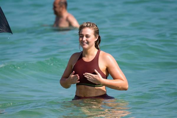 Iskra Lawrence in a swimsuit on Miami beach doing a photoshoot for Aerie on 11/26/2018