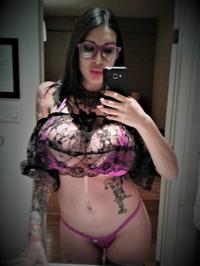 Ariane Saint Amour in lingerie taking a selfie