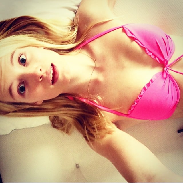 Maud Welzen in a bikini taking a selfie