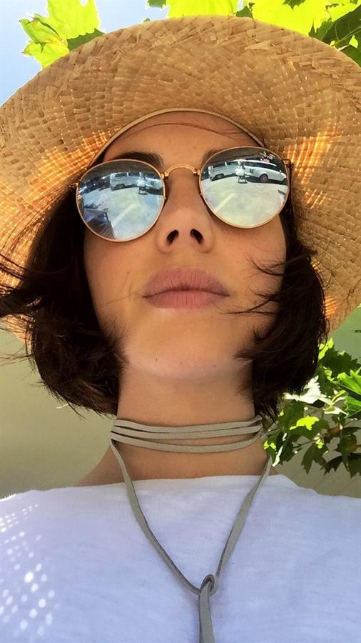 Adelaide Kane taking a selfie