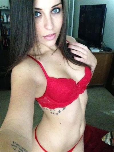 Elizabeth Barela in lingerie taking a selfie