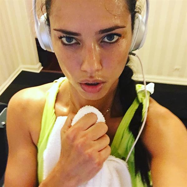 Adriana Lima taking a selfie