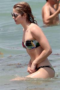 Emily Bett Rickards in a bikini