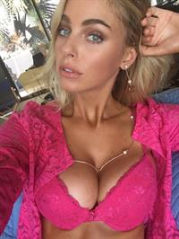 Elizabeth Turner in lingerie taking a selfie