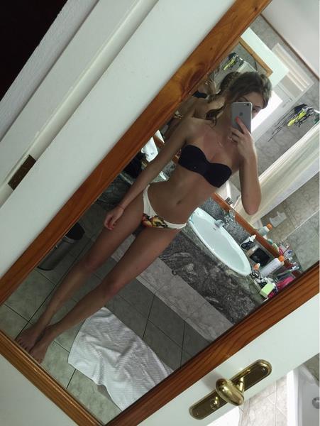 Anonymous in a bikini taking a selfie