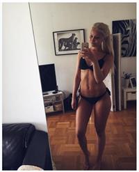 Victoria Lindqvist in a bikini taking a selfie