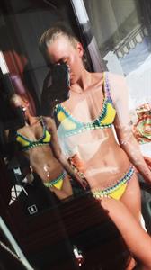 Anonymous in a bikini taking a selfie