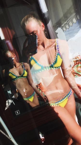 Anonymous in a bikini taking a selfie