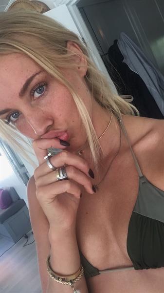 Anonymous in a bikini taking a selfie