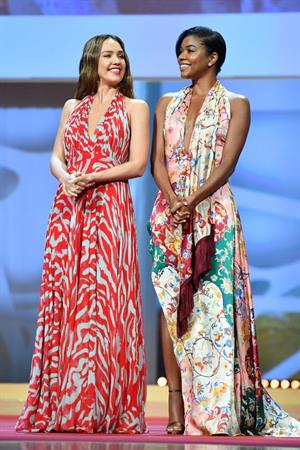 Jessica Alba sexy photos on the red carpet in a low cut dress with Gabrielle Union both showing nice cleavage.



