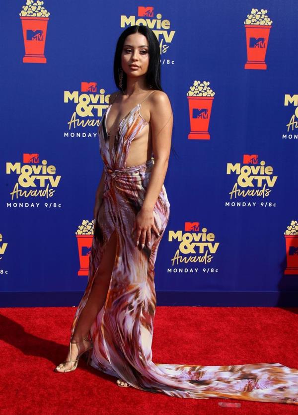 Alexa Demie braless boobs in a revealing dress on the red carpet at the 2019 MTV Movie and TV Awards.






















