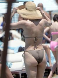 Katharine McPhee sexy bikini photos showing her boobs and ass seen by paparazzi.



