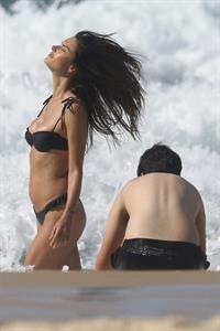 Alessandra Ambrosio sexy ass bikini body seen by paparazzi at the beach.

