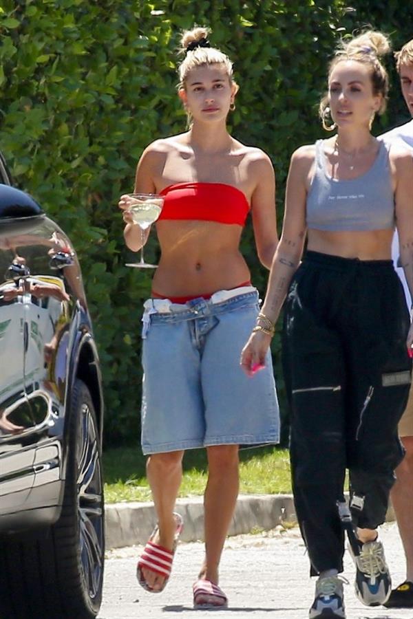 Hailey Baldwin Bieber in a sexy red bikini out with Justin Bieber seen by paparazzi.




