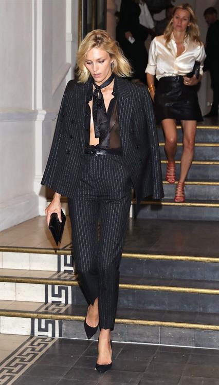 Anja Rubik sexy braless see through top showing her tits seen by paparazzi.





