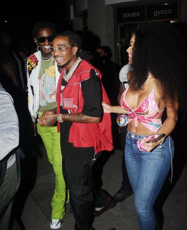 Saweetie sexy boobs showing nice cleavage seen by paparazzi with Quavo.












