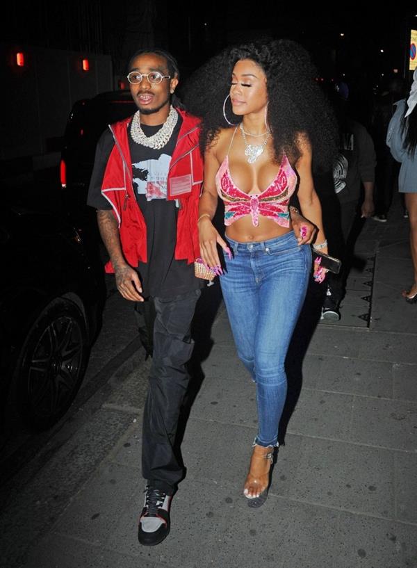 Saweetie sexy boobs showing nice cleavage seen by paparazzi with Quavo.












