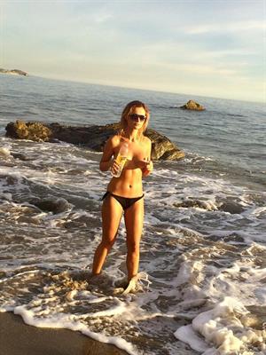 Ella Rose Nude Pictures Ella Rose in a topless beach photoshoot