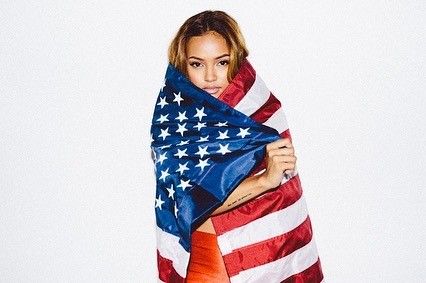 Karrueche Tran sexy in a bikini top showing some nice cleavage for the 4th of July.



