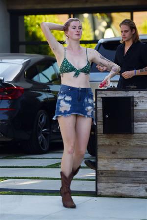 Ireland Baldwin sexy in a bikini top seen by paparazzi showing some nice cleavage.








