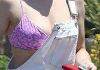 Ariel Winter areola peek in a sexy bikini top seen by paparazzi buying liquor.









