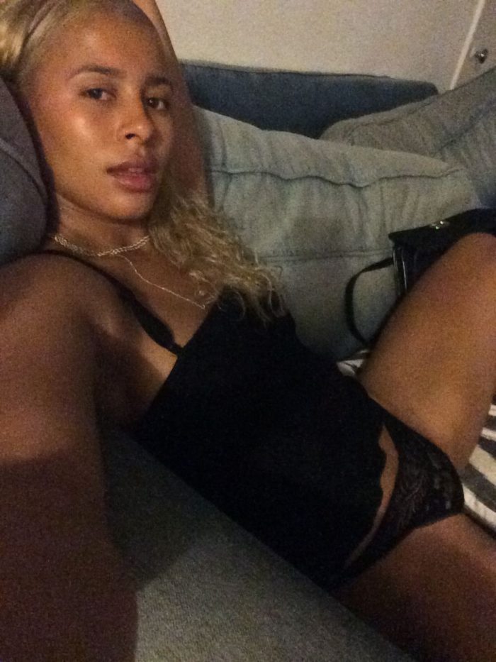 Sami Miro in lingerie taking a selfie