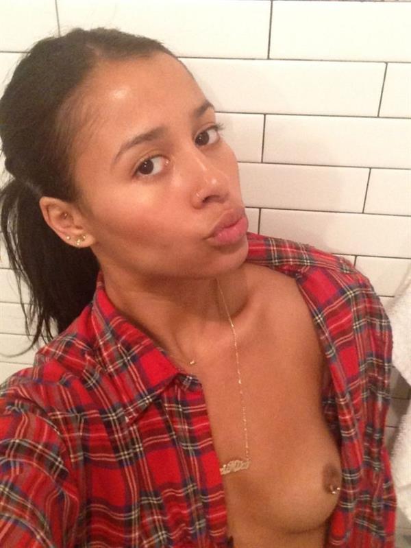 Sami Miro taking a selfie and - breasts