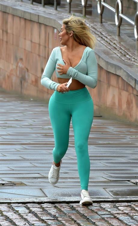 Chloe Ferry Pictures Chloe Ferry braless tits pokies in a tight blue outfit showing off her ass and boobs seen by paparazzi.