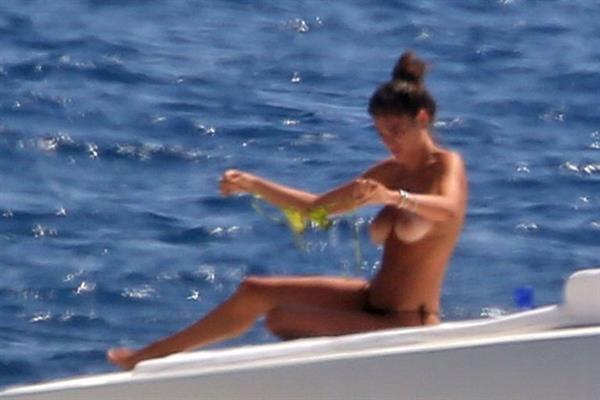 Francesca Sofia Novello caught topless by paparazzi tanning with her nude boobs exposed.
