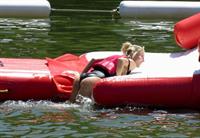 Elsa Pataky sexy ass and cleavage in a swimsuit seen by paparazzi with Chris Hemsworth.














