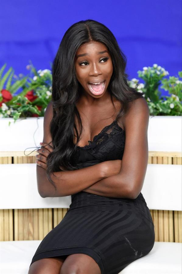 Yewande Biala from Love Island sexy in a tight black dress on  I Saw It First HQ .















