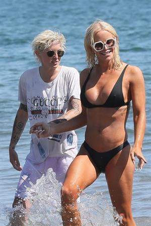 Gigi Gorgeous sexy cleavage in a bikini at the beach with Nats Getty seen by paparazzi.



