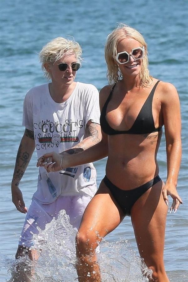 Gigi Gorgeous sexy cleavage in a bikini at the beach with Nats Getty seen by paparazzi.



