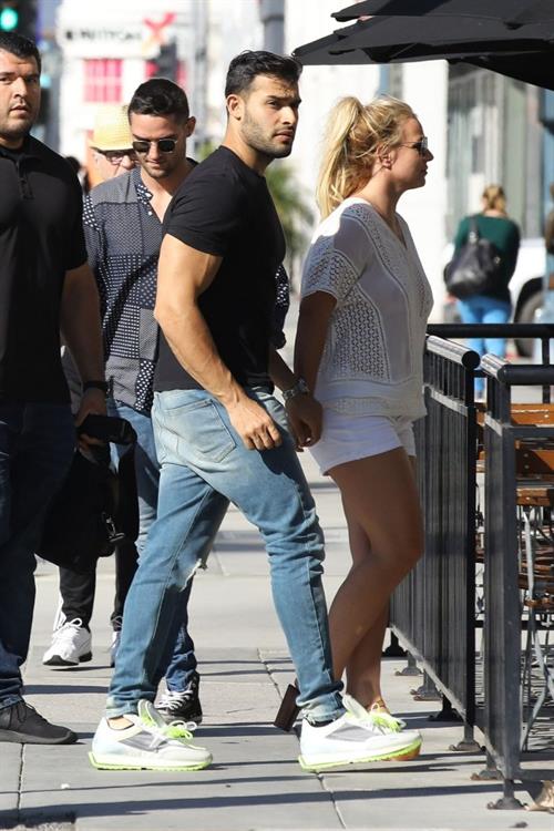 Britney Spears Pictures Britney Spears braless boobs in a see through blouse showing her nipples seen by paparazzi.