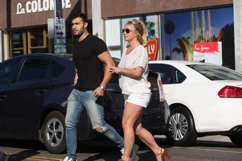 Britney Spears braless boobs in a see through blouse showing her nipples seen by paparazzi.


