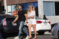 Britney Spears braless boobs in a see through blouse showing her nipples seen by paparazzi.


