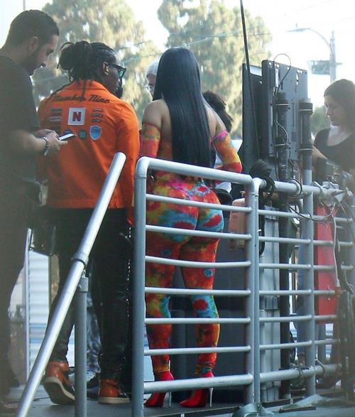 Cardi B Pictures Cardi B boobs and booty on display on and off stage showing nice cleavage and her sexy ass in a tight dress.