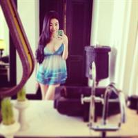 Elly Tran Ha taking a selfie