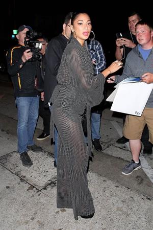 Nicole Scherzinger sexy in a see through outfit showing her braless boobs and ass seen by paparazzi.
