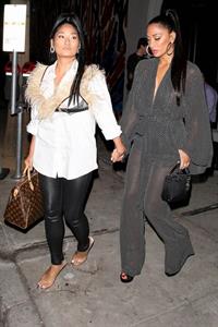 Nicole Scherzinger sexy in a see through outfit showing her braless boobs and ass seen by paparazzi.
