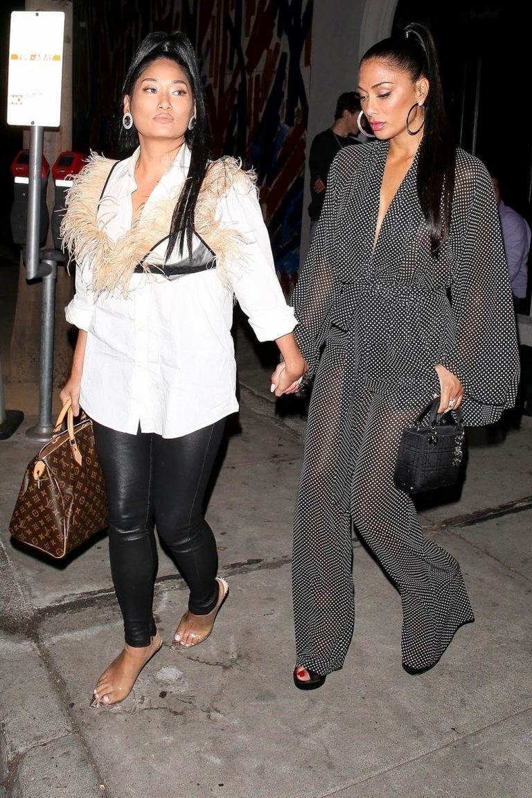 Nicole Scherzinger sexy in a see through outfit showing her braless boobs and ass seen by paparazzi.
