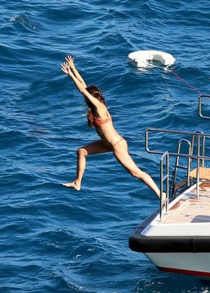 Sara Sampaio sexy ass and cleavage in a thong bikini seen by paparazzi.

