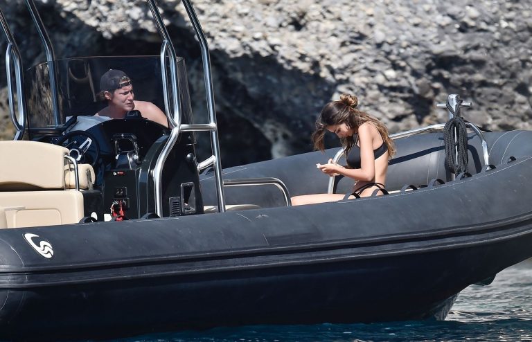 Mădălina Diana Ghenea Bikini Pictures Madalina Diana Ghenea sexy ass and cleavage in a thong bikini seen by paparazzi.