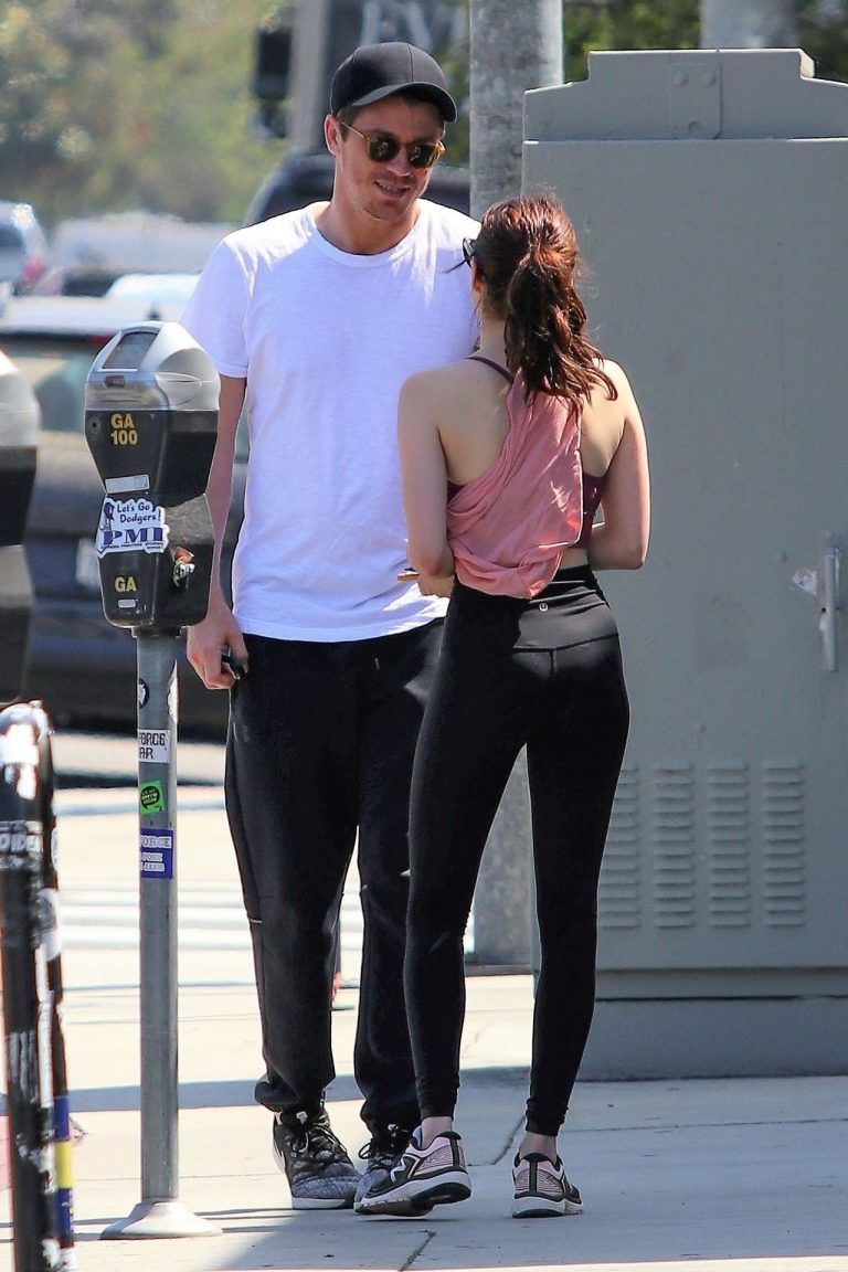 Emma Roberts Pictures Emma Roberts sexy little ass and thigh gap in tight pants seen by paparazzi with Garrett Hedlund.